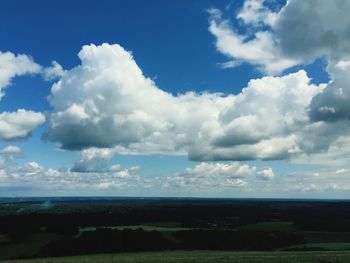 Scenic view of landscape against cloudy sky