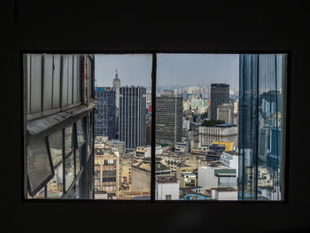 Buildings seen through window