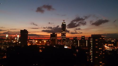 Illuminated cityscape at night