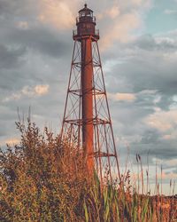 Low angle view of lighthouse against sky during sunset