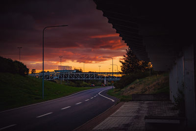 Empty road at sunset