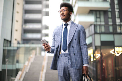 Young man looking at camera