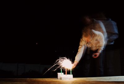 Light painting on table at night