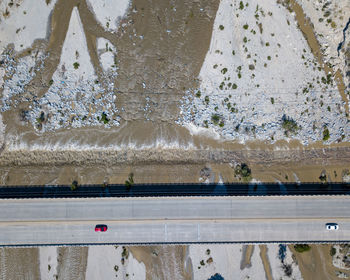 High angle view of trees by wall during winter