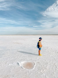 Full length of a man on snowy landscape