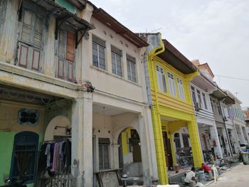 Low angle view of buildings against sky