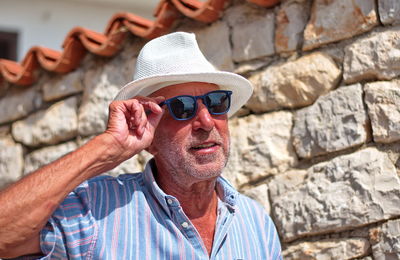 Portrait of man wearing sunglasses