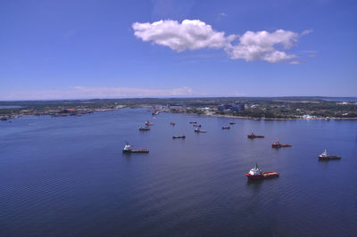 High angle view of boats in calm blue sea