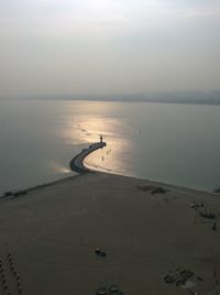 Scenic view of sea against sky at sunset