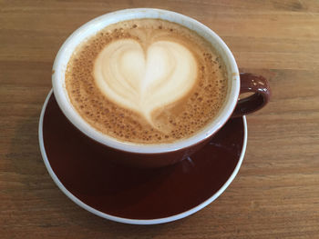 Close-up of cappuccino on table