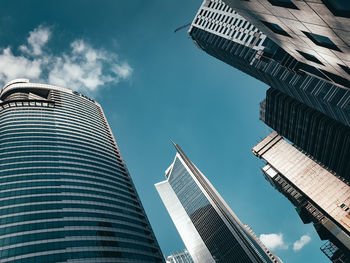 Low angle view of modern buildings against sky