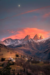 Scenic view of mountains against sky during sunset