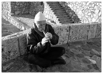 Man sitting on staircase