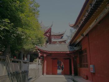 Corridor of building against sky