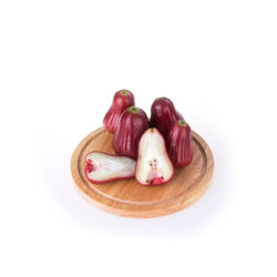 High angle view of vegetables in plate against white background