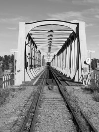 Railway bridge against sky on sunny day