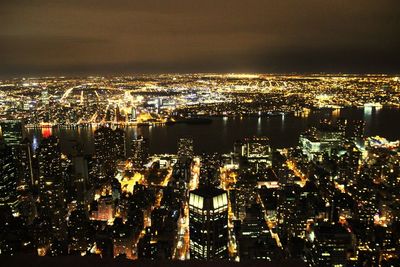 Illuminated cityscape at night