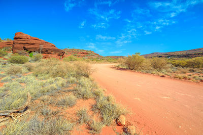 View of landscape against blue sky