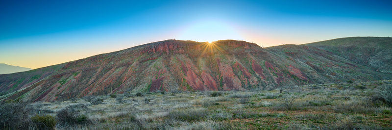 Sunrise over red rock cliffs in tonto national forest, arizona.