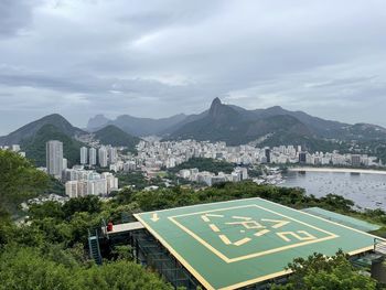 High angle view of road by mountain against sky