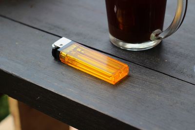 Close-up of gas lighter on table