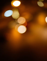 Defocused image of illuminated christmas lights