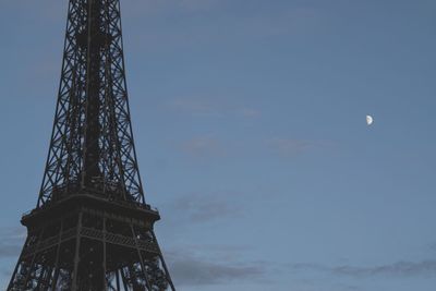 Low angle view of tower against cloudy sky