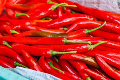 High angle view of red chili peppers for sale in market