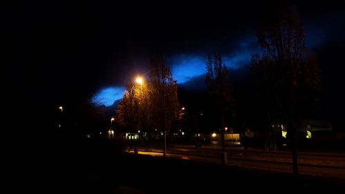 View of illuminated street light at night