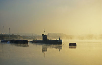 Boats moored at commercial dock