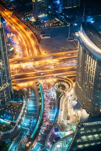 High angle view of illuminated cityscape at night