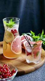 Fruits in glass on table