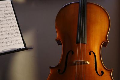 High angle view of piano keys on paper