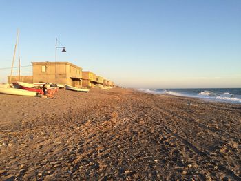 View of beach against clear sky