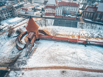 High angle view of snowy townscape