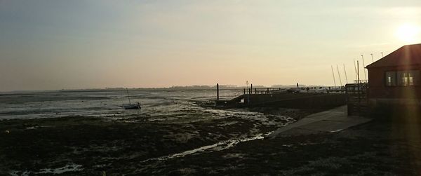 Scenic view of sea at sunset