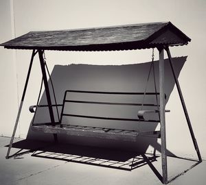 Lifeguard hut on beach against sky