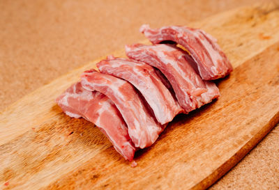 Close-up of chopped meat on cutting board
