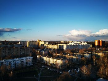 High angle view of buildings in city against sky