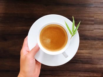 High angle view of coffee cup on table