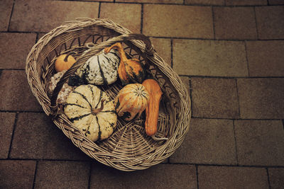 High angle view of wicker basket on floor