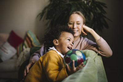 Mother and daughter relaxing at home