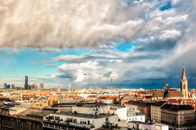 Aerial view of cityscape against sky