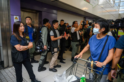 Group of people standing in building