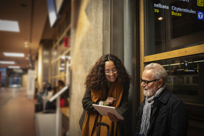 Couple on train station platform