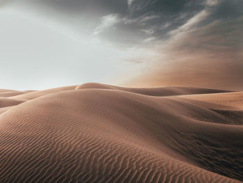 Scenic view of desert against sky