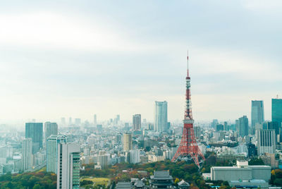 Modern buildings in city against sky