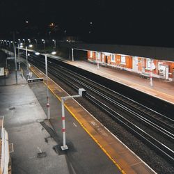 Railroad station platform at night