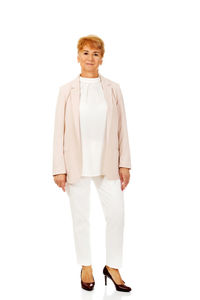 Portrait of a woman against white background