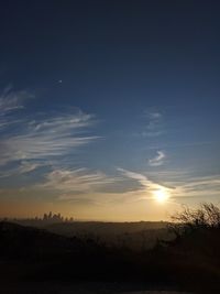 Scenic view of silhouette landscape against sky during sunset